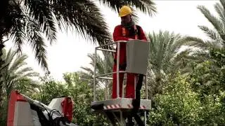 COMET OFFICINE - XIRAFFE. A compact X-shaped lift mounted on a ATV ideal for works in tall trees.
