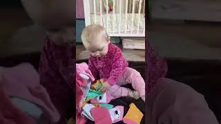 baby kayla having a blast playing with socks 😄🧦