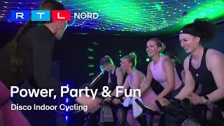 Sport-Trend: Partystimmung beim Indoor Disco Cycling