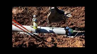 Installing concrete pipe in the trench