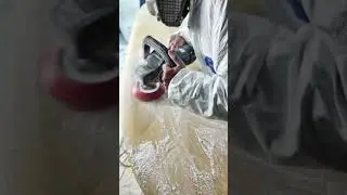Surfboard sanding by professional