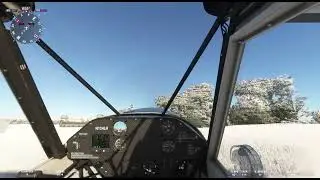 Savage Cub on skis lands at and departs 94MI Red Aero Flight Park MI