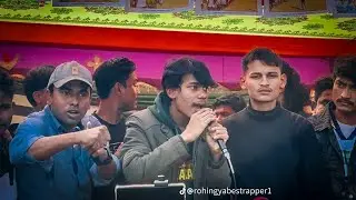 Rohel Khan song for Oo Arkhan at a refugee camp concert, uniting the crowd in an emotional moment.