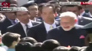 PM Shri Narendra Modi greets people outside Hyogo House