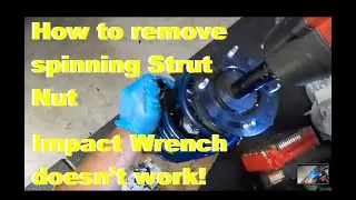 How to remove strut spinning nut. Impact wrench doesn't work