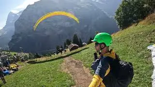 paragliding from Murren part 1 going off the mountain cliff.