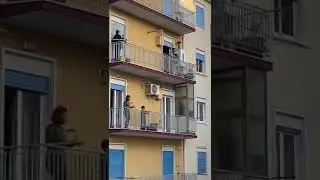 CoronaTimes italians sing in the balcony