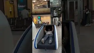 Man Showcases Passenger Relaxation Area at Baku International Airport