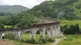 Jacobite Train on Glenfinnan Viaduct in Scotland - Harry Potter Hogwarts Express movie location.