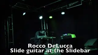 Rocco de Lucca playing slide guitar at Slidebar April 29, 2015