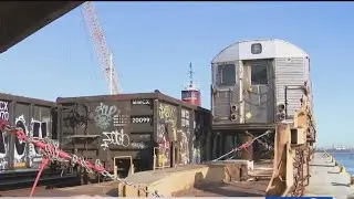 Retired NYC subway cars on the way to recycling plant