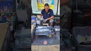 South American street artist at work