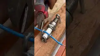 Mounted a motorcycle spark plug with nails and#USA #MechanicHack #SmartFixation #CreativeRepair