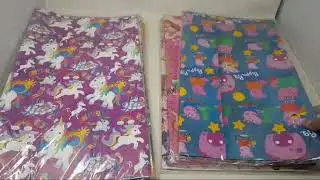 Cartoon Print, 70cm x 50 cm gift wrapping sheets. 25 sheets per packet.