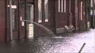 Kades en straten regio Rotterdam onder water