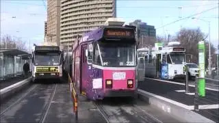 Melbourne Trams passing the new interchange at Domain & St Kilda Rds