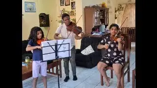 Mr Brain lia Teaching Janki and Devki Violin class in South Central Africa (MALAWI)