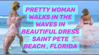 Pretty woman walks through the waves . Saint Pete Beach , Florida ☀️