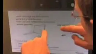 A multi-touch display that can 'see' objects too