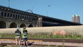 Drone crew flying to shoot video clips of downtown St Louis