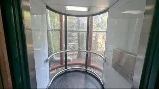 Library lookout: Modded Johns Perry hydraulic glass lift at North Sydney library, North Sydney, AUS