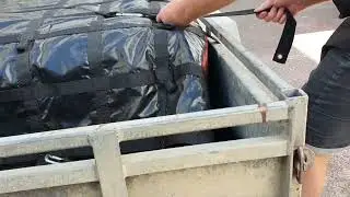 Easily securing a load on a trailer with a Safeguard Cargo Net - safe, secure and covered