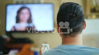 Asian Man Watching Tv Rear View