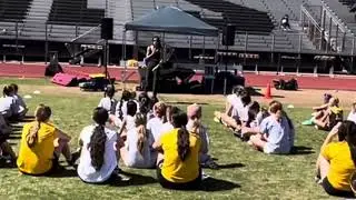 Krysten Muir shares story at football camp