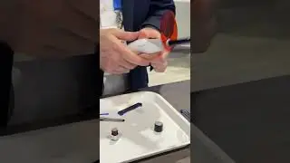 Zach Burkett, Global Product Manager, demos EtchFree Bonding at the Ormco booth