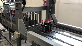 Shrink wrap machine for bottles