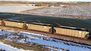 Drone video of southbound Union Pacific coal train south of Cambridge, Iowa on the Spine Line