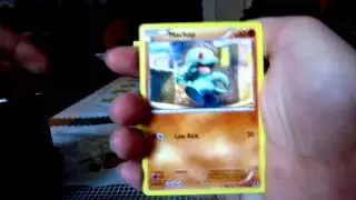 Opening a Pokemon XY Fall 2014 Venasaur EX Power Trio Tin