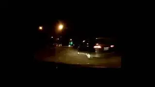 Van makes sketchy right-on-red in front of me
