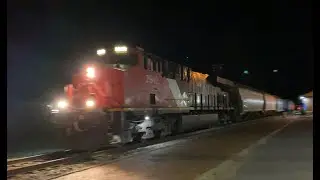 One Strong Locomotive CN 2942 solo ES44AC lead a 152 car long grain train up the grade.