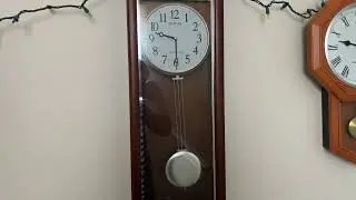 Rhythm musical chiming wall clock chiming 9:30 AM (Westminster chime)