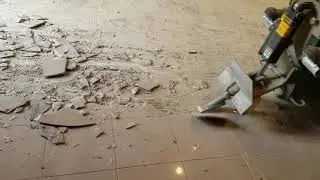 Tile removal by Gabriel Homes 5700 scraper January 23, 2020