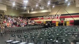 Patton High School graduates enter the gym for their graduation ceremony