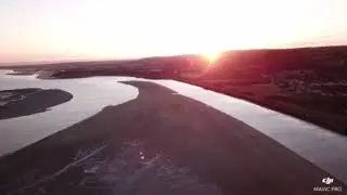 Drone Flight on a lovely sunset beach, Llanelli, Carmarthenshire, Wales, UK