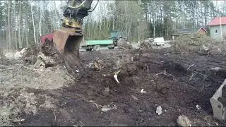 Volvo ECR88 digging some stumps