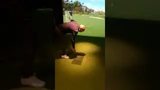 Virtual Golf Studio - Hitting the ball from the mat.