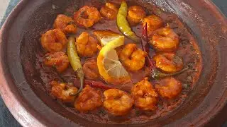 طاجين بيل بيل بالقمرون على طريقة الإسبانية(Pil Pil with Shrimp, Spanish Style)