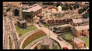 A standard Class 5MT and a Class 101 multiple unit going around my model railway.