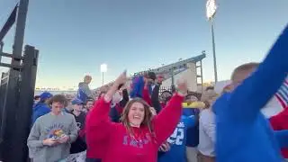 Kansas fans knock over the goalposts & throw them in a lake after win