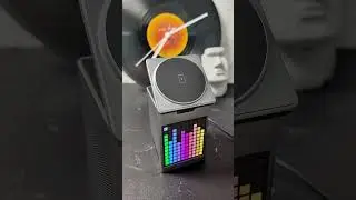 3-in-1 Wireless Charger with Pixel Clock & Bluetooth Speaker!