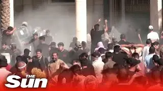Iraqi protesters flee gunfire outside government palace as police open fire on crowds