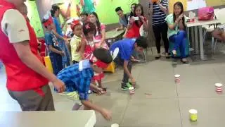 Cups and popsicle stick birthday party game at jollibee