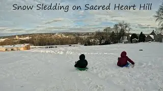 Snow Sledding on the Sacred Heart Hill in Sharon, Pa