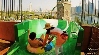 Green & White Tube Water Slide at Pearls Kingdom Waterpark