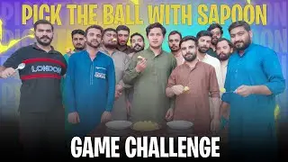 Pick the ball with spoon