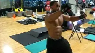 DEWON WHITE ( THE D1 SPECIAL) CABLE CROSS WORKING THE REAR DELTOID / BACK WORK